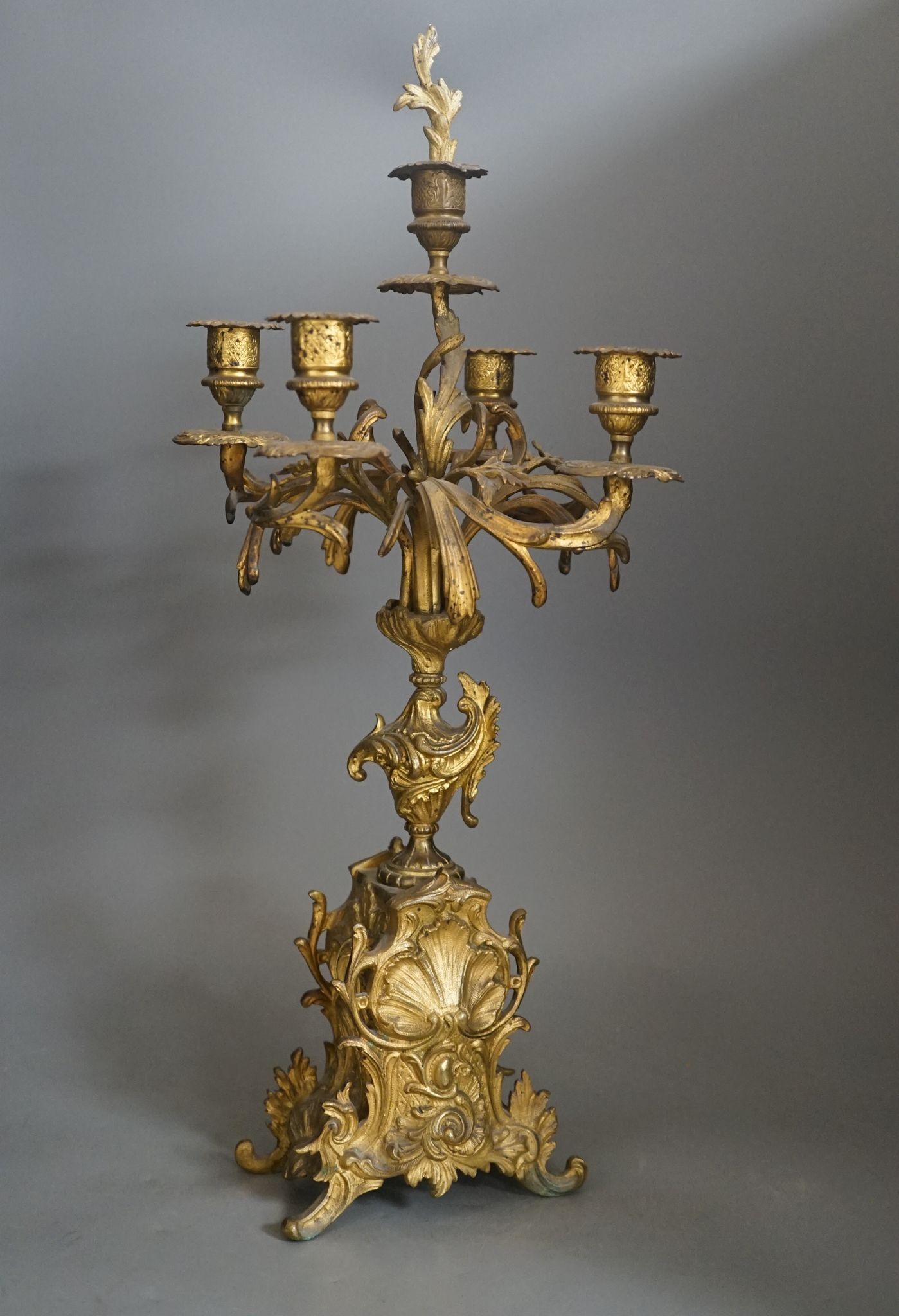 A pair of gilt brass five light candelabra 56cm